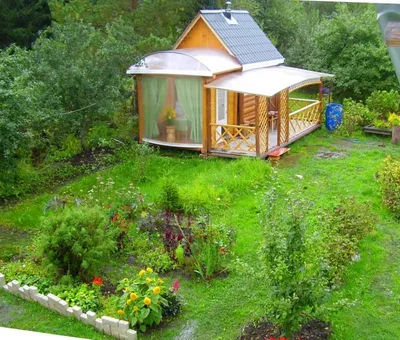 Ландшафтный дизайн участка с баней, бассейном, садом и костровой зоной -  Проект дома