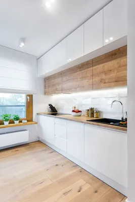 Белая матовая кухня с деревянной столешницей - 69 фото