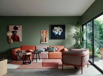 Дизайн гостиной в зеленых тонах, сочетание цветов и фото интерьеров