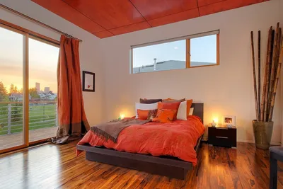 Оранжевая спальня - фото использования самого сочного цвета