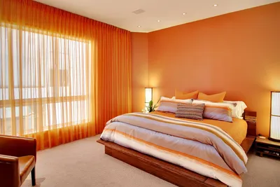 Оранжевый цвет в интерьере спальни - 70 фото