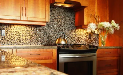 Чем лучше отделать стены на кухне: выбор материала декорирования