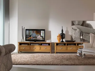 Комод под телевизор предназначен для техники и хранения вещей