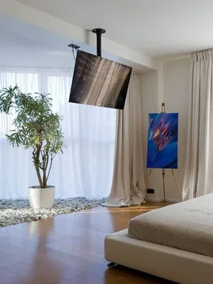 Актуальный дизайн гостиной: как вписать телевизор в интерьер