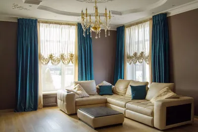 Синие шторы: применение в интерьере гостиной, спальни и кухни, фото