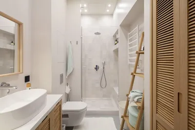 Интерьер ванной комнаты: чем заменить шкаф над умывальником - фото