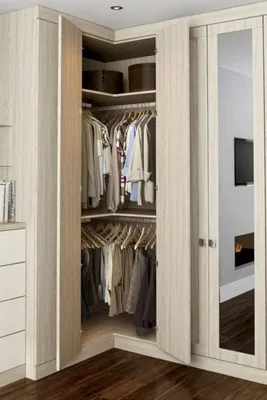 Угловой шкаф в гостиную: варианты дизайна в современном стиле. Фото  красивых идей оформления и сочетаний мебели в интерьере