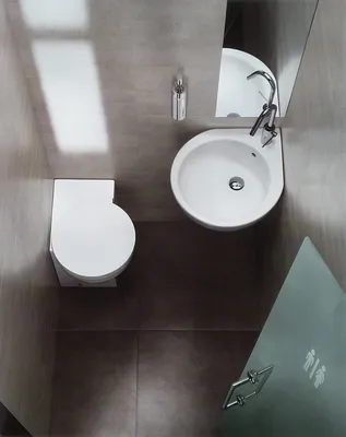 Дизайн маленького туалета от Hatria | Фотографии интерьера | Туалетная  комната размером 1 кв. м.
